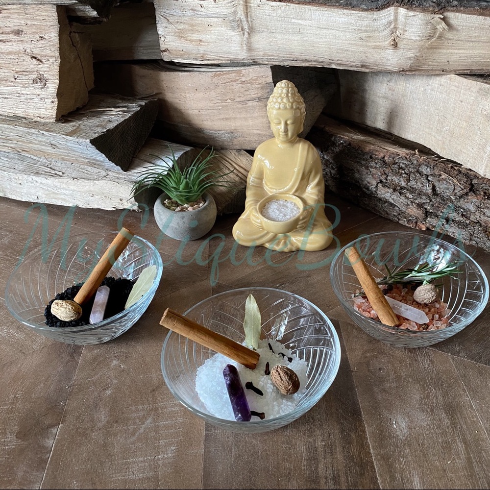 Salt bowls with crystals, herbs and spices